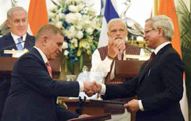 PM Modi and Mr Netanyahu witnessing the signing of an agreement